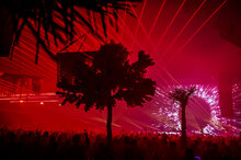 Party in a polygon tent with laser show