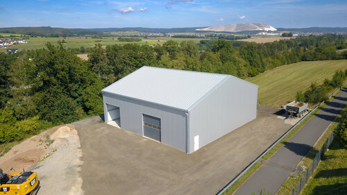 Industrial cargo hall in a rural setting