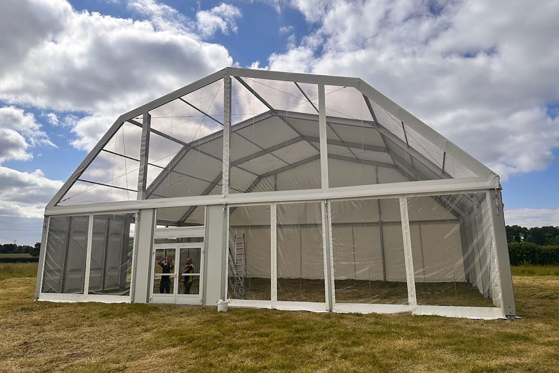 Polygon tent under construction exterior view