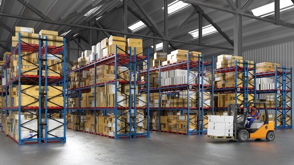 Temporary storage facility with high shelves filled with boxes and pallets, while a forklift truck transports goods