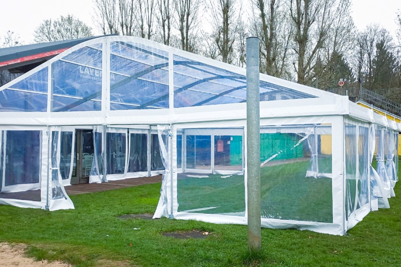Exterior view of a party tent with foil roof and foil walls